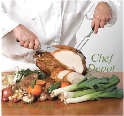 the Chef is carving a turkey for Thanksgiving Holiday Feast